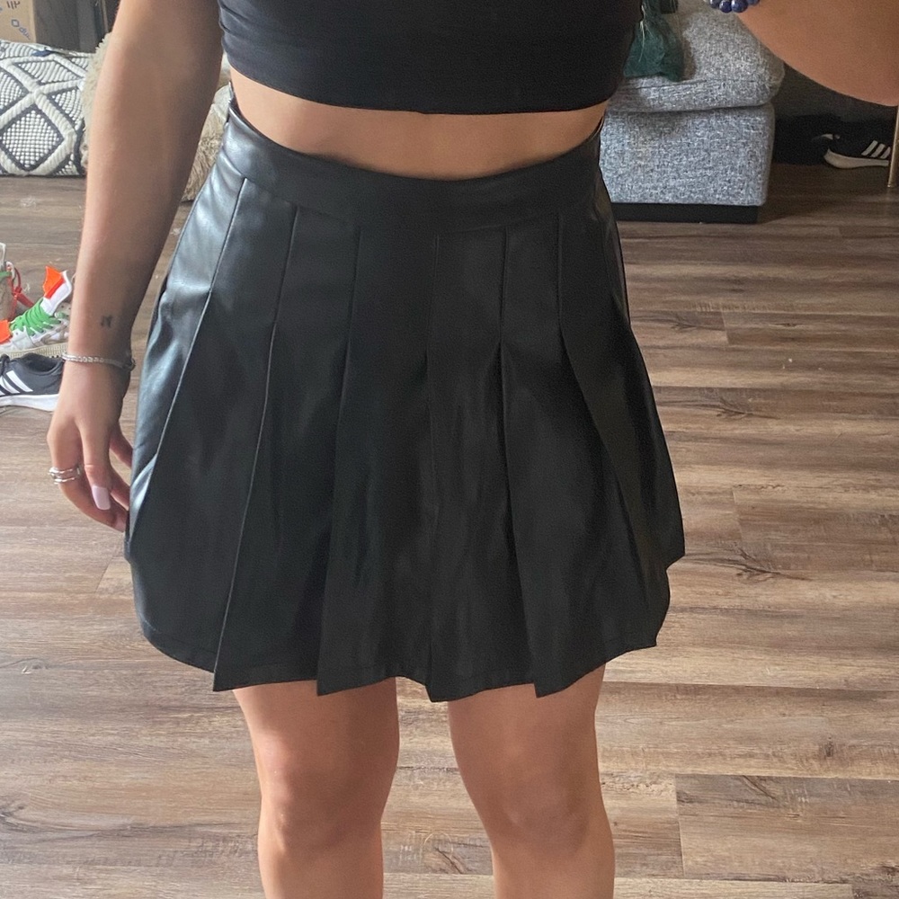 Leather pleaded school skirt